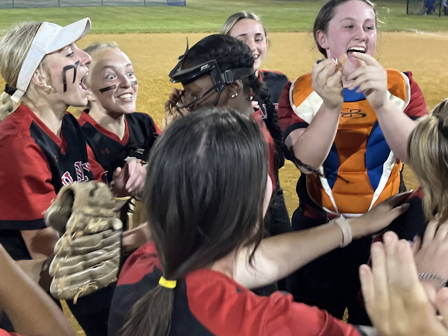Dulaney's softball team celebrate after the final out of Tuesday's Class 4A state semifinal. The Lions secure their first state final appearance since 2003 with a 7-2 victory over No. 15 Broadneck at Bachmann Park in Glen Burnie.
