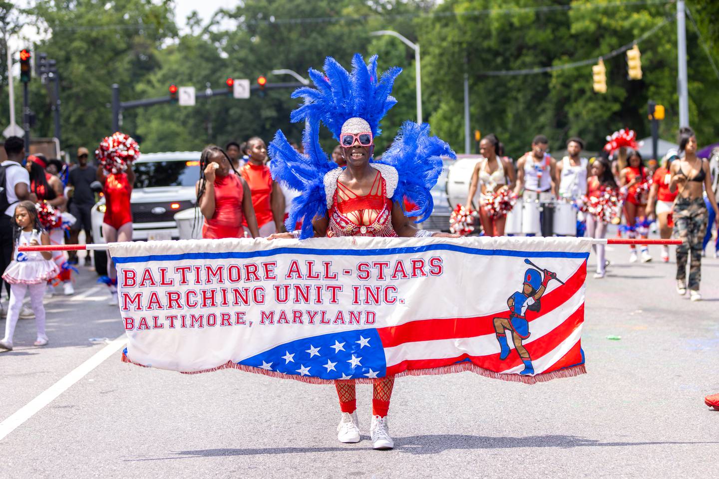 Baltimore All-Stars Marching Unit Inc. leader marching during the annual Baltimore Washington ONE Carnival in Baltimore, MD on Saturday, July 8, 2023.
