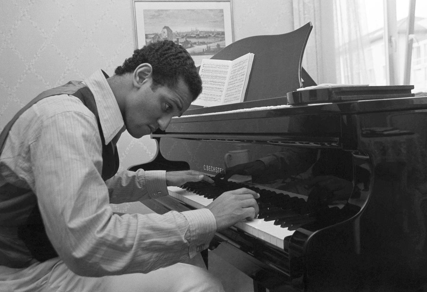 Andre Watts, 16, performs the Liszt piano concerto No. 1 with the New York Philharmonic, on Jan. 31, 1963. Watts died Wednesday, July 12, 2023 in Bloomington, Ind., at age 77. (AP Photo/Matty Zimmerman, File)