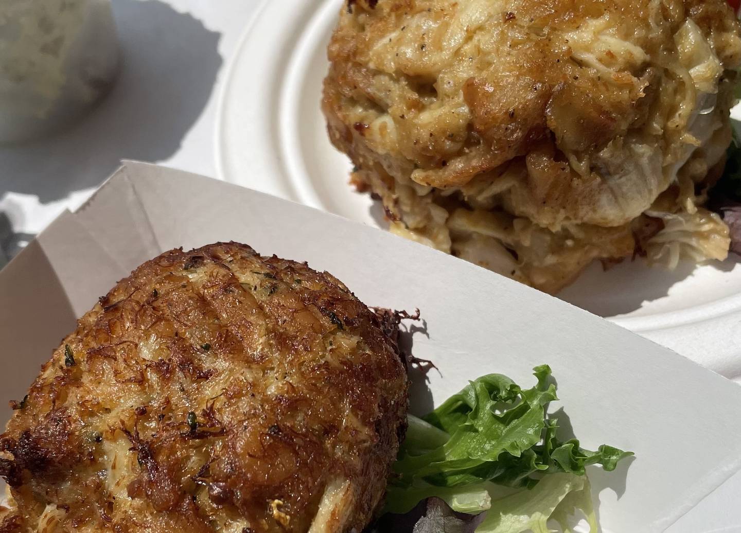The backfin crab cake at Faidley Seafood is  as delicious as the jumbo lump version (right) but costs around $10 less.