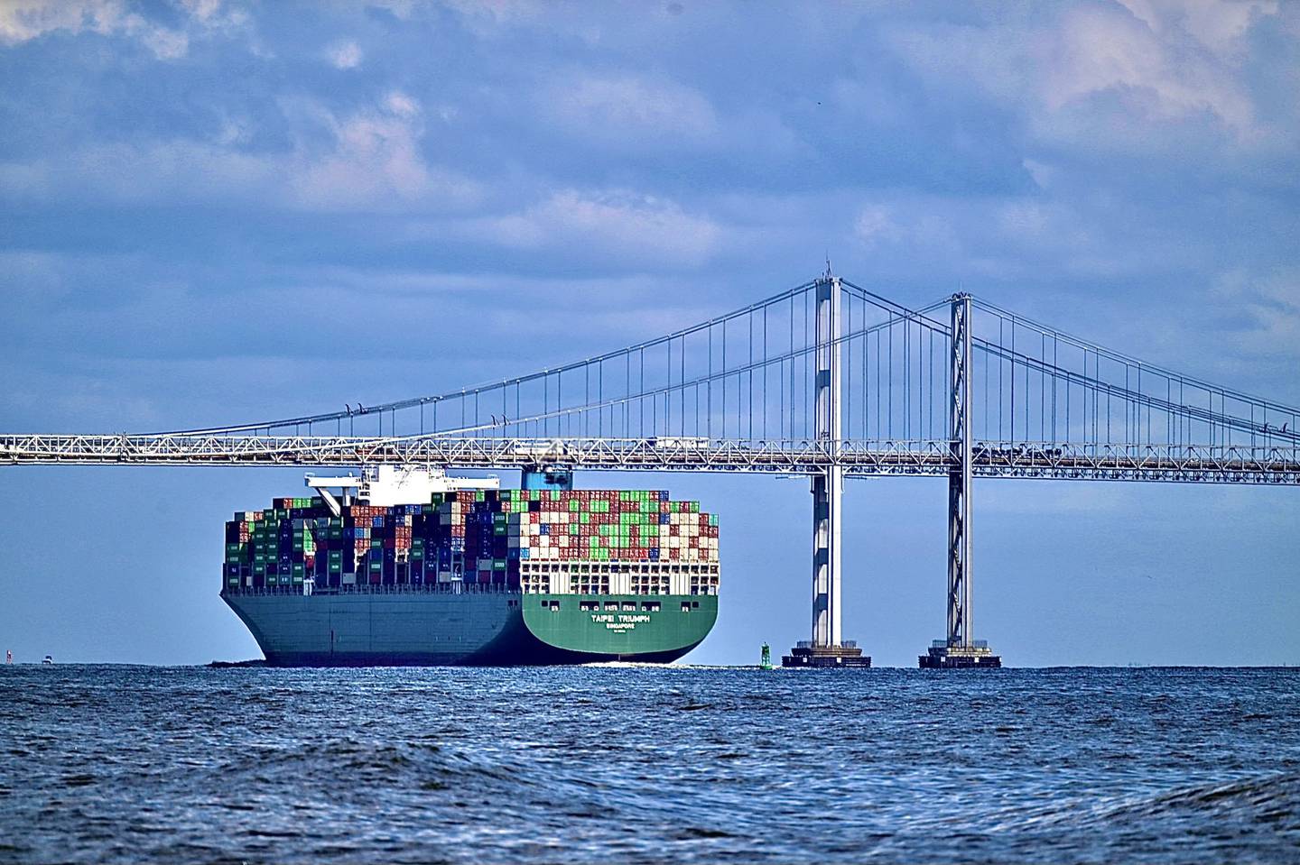 The Taipei Triumph, a 7-year-old container ship out of Singapore, passing underneath the Chesapeake Bay Bridge