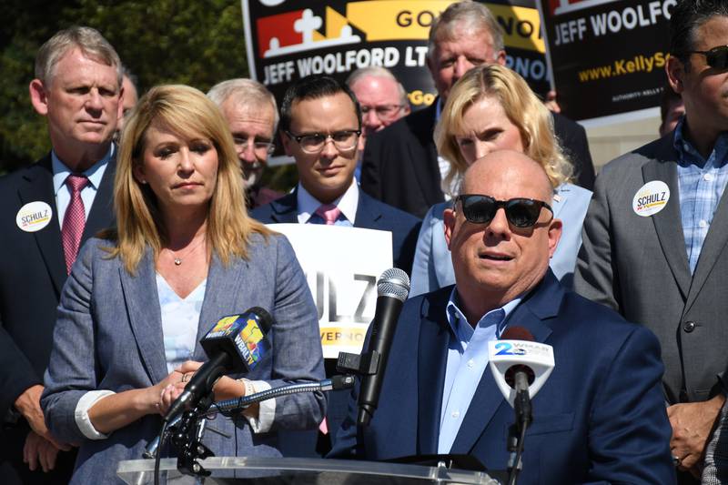 Maryland Gov. Larry Hogan speaks at a press conference on Lawyers Mall on June 30, 2022 to denounce "meddling" by the Democratic Governors Association in the Republican primary for governor. Hogan is supporting Kelly Schulz, at left.