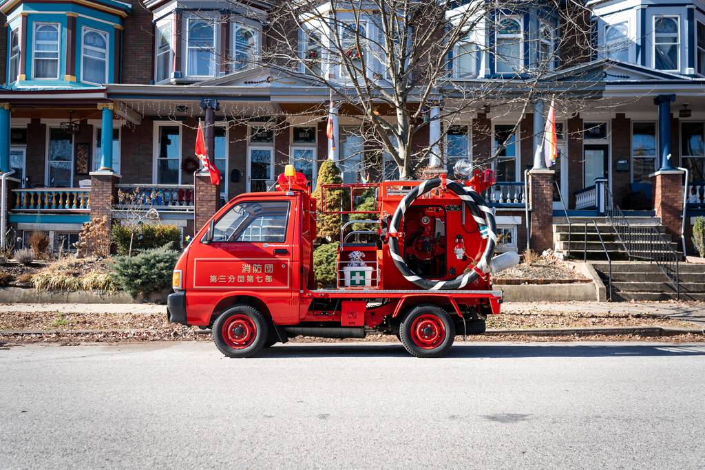 Yama is a tiny Japanese firetruck driven by attorney Brett Rogers around Baltimore. It's parked here in Charles Village on January 24, 2023.