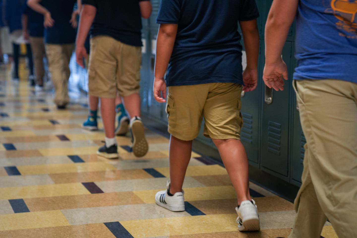 Students walk through the hall inside Hampstead Hill Academy on 8/29/22. Monday was the first day back to school for Baltimore City students.