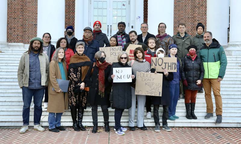 Community members, faculty and students who oppose the formation of a private police force at Johns Hopkins University.