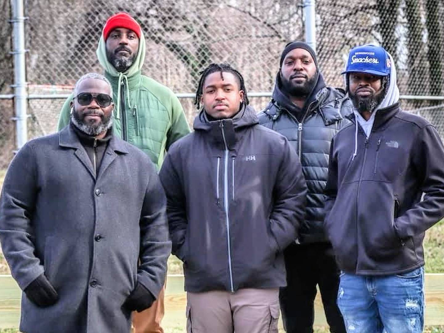 Members of the Annual Fathers Day Foundation met recently at Browns Woods Park, from left, James Henson, Kenyatta Rowel, Brandon Johnson, Tyrone Johnson and Devon Edwards Sr.