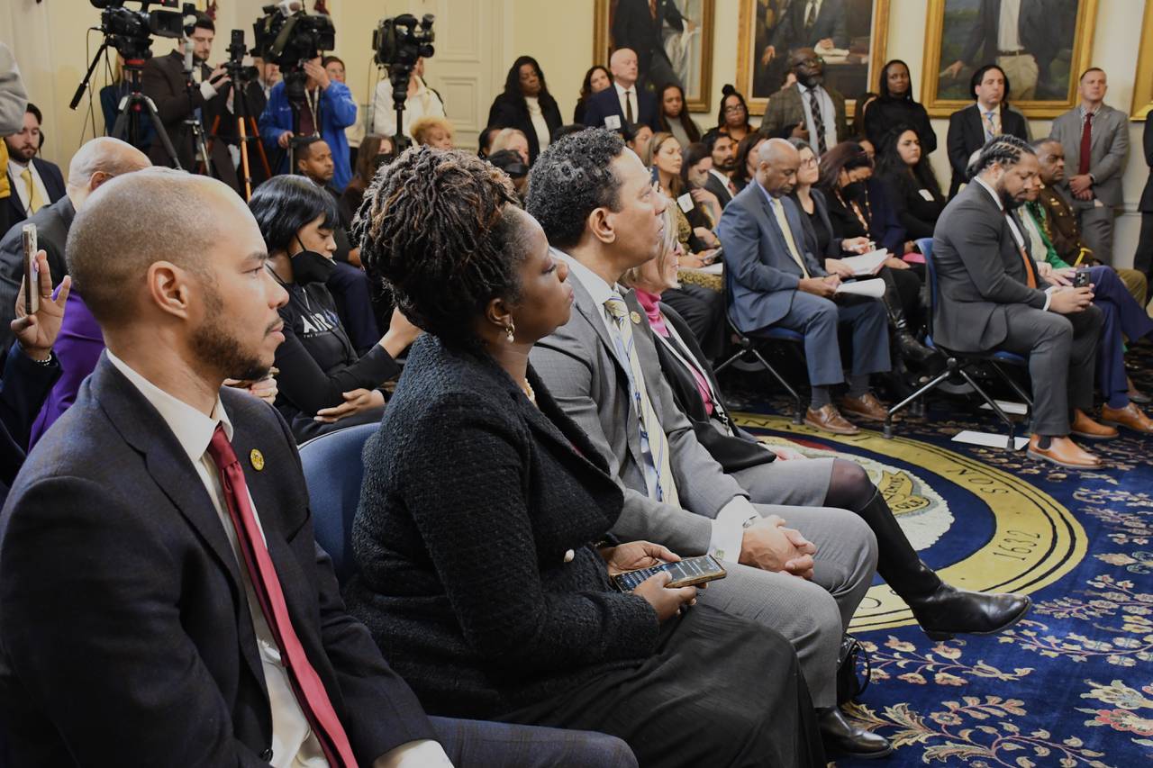 The state's attorneys listen during Gov. Wes Moore's press conference to announce public safety proposals, from left: Howard County State's Attorney Rich Gibson, Prince George's County State's Attorney Aisha Braveboy and Baltimore State's Attorney Ivan Bates. Moore held the press conference on Tuesday, Jan. 9, 2024.
