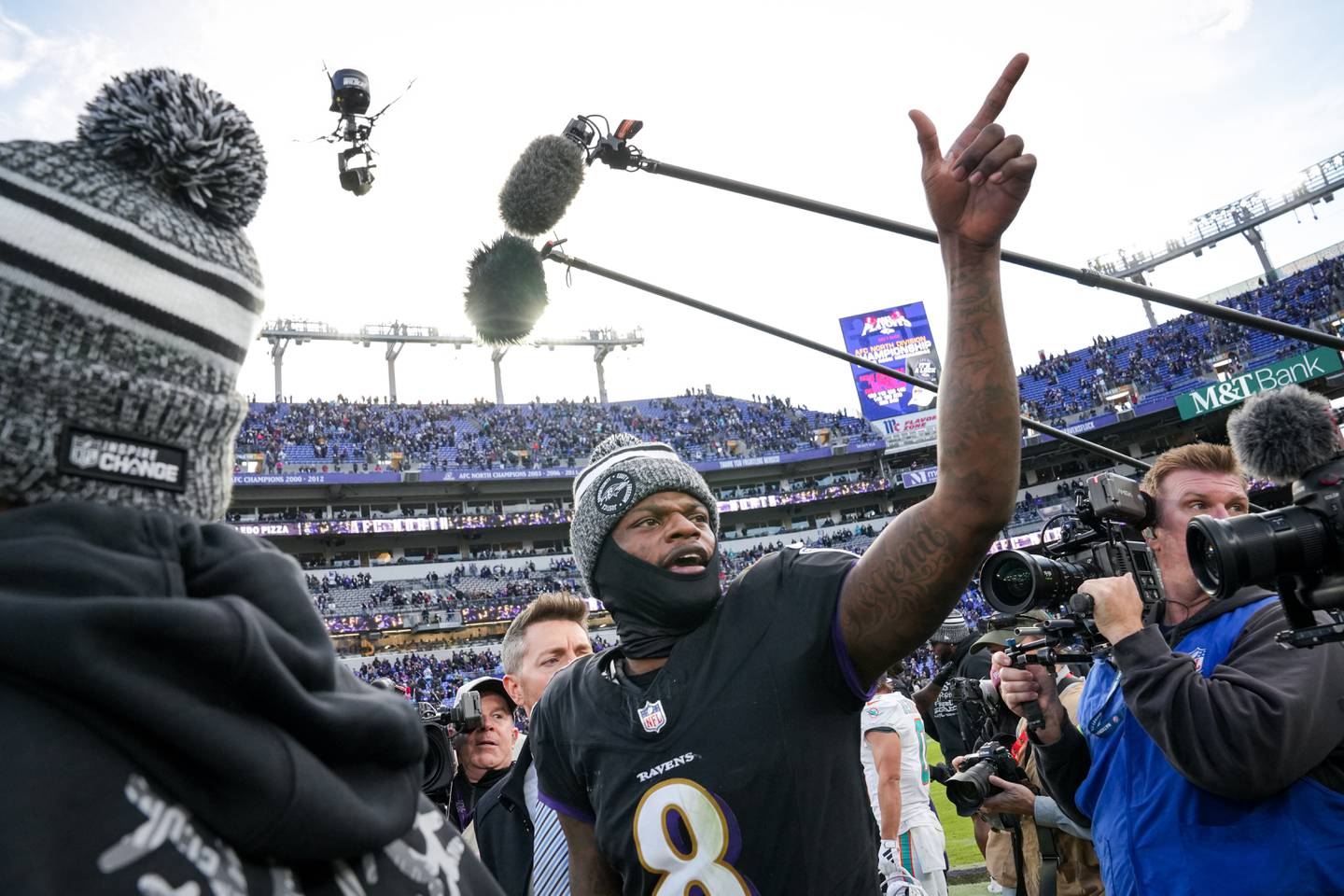 Baltimore Ravens quarterback Lamar Jackson (8) walks off the field after beating the Miami Dolphins at M&T Bank Stadium on Sunday, December 31, 2023. The Ravens won, 56-19, to secure the best record in the AFC.