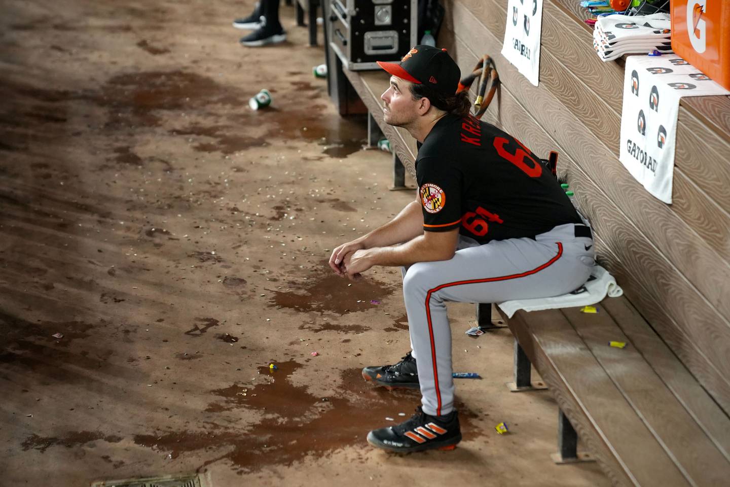 Orioles starter Dean Kremer looks on after being pulled from Game 3 against the Texas Rangers with two outs in the second inning. He gave up six earned runs.