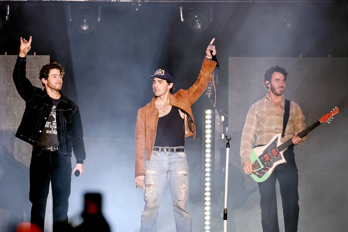 Nick Jonas, Joe Jonas and Kevin Jonas of The Jonas Brothers perform onstage during AT&T Playoff Playlist Live at Banc of California Stadium.