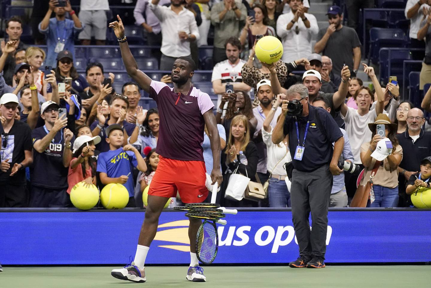 Frances Tiafoe, of the United States, acknowledges the crowd after losing to Carlos Alcaraz, of Spain, during the semifinals of the U.S. Open tennis championships, Friday, Sept. 9, 2022, in New York.