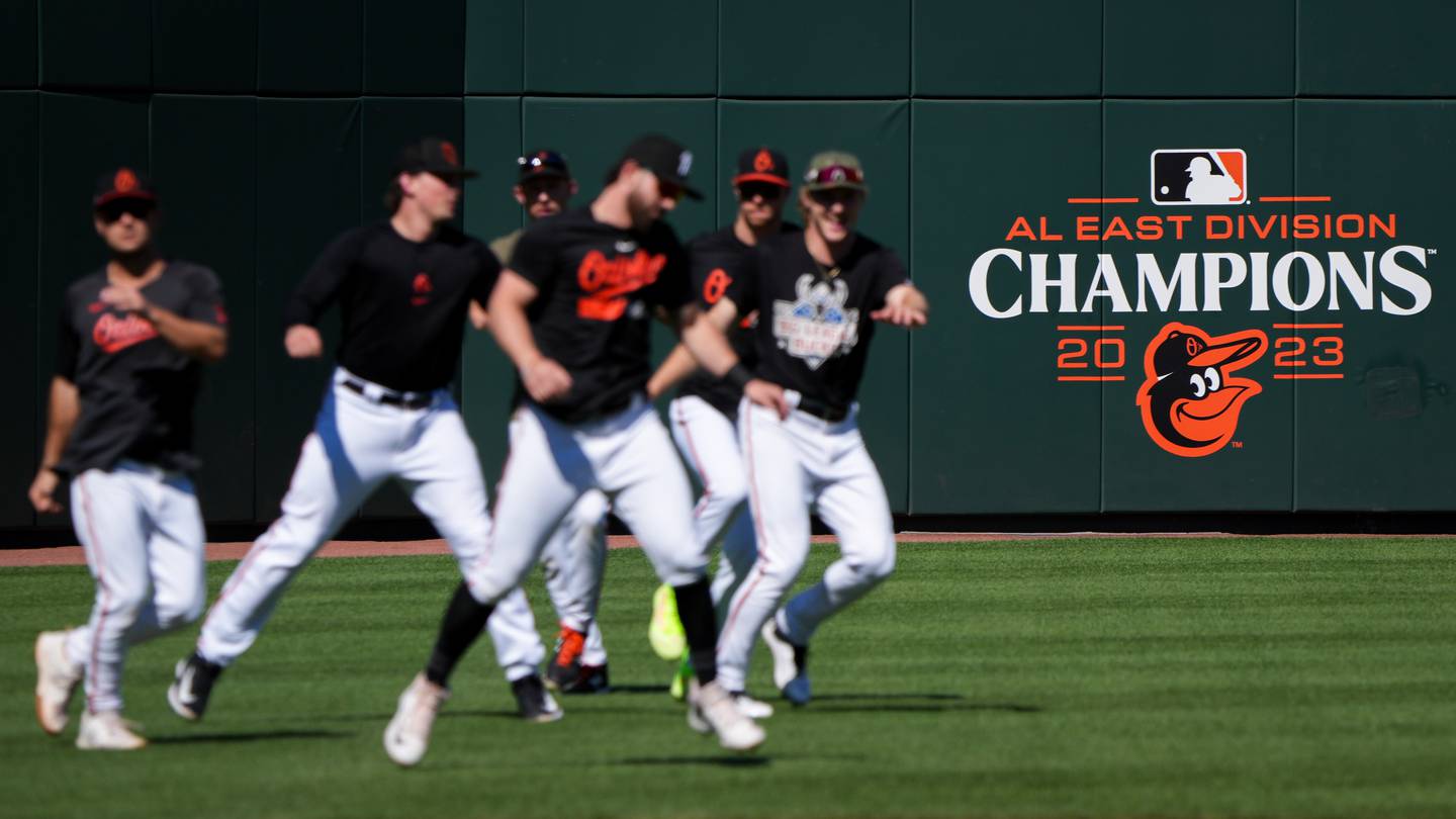 The Baltimore Orioles warm up during an open practice at Camden Yards on Wednesday, October 4, 2023. The Baltimore Orioles are preparing for their first postseason game in the ALDS against the Texas Rangers on Saturday.