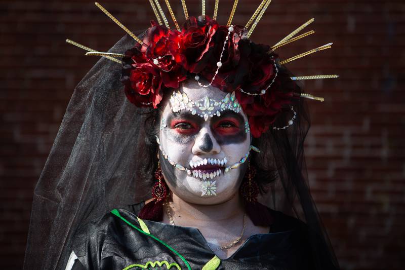 11/5/22 – Alondra Flores, a teacher with the Juventud Latina program, dresses in traditional Día de los Muertos attire as part of Creative Alliance's Día de Muertos Celebration on Saturday.