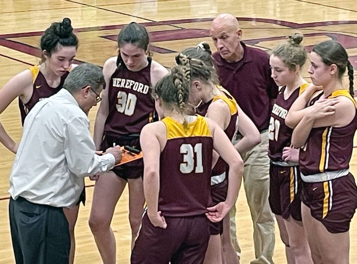 Hereford coach Dave Schreiner draws up a play for the Bulls late in their 41-38 state semifinal loss to Kent Island. The Bulls, who were state finalists last season and reached the final four three of the past four years, finished the season 19-5.