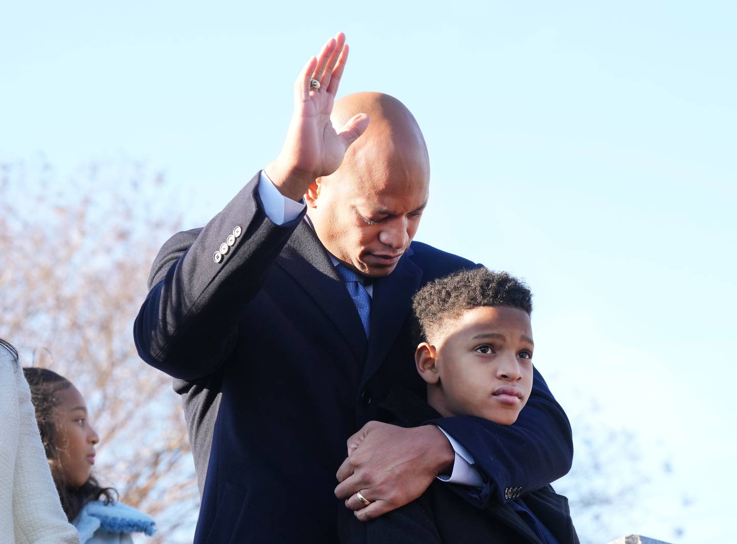 Wes Moore with son James Moore at the Kunta Kinte-Alex Haley Memorial to lay a wreath and say a prayer before the governor-elect is sworn in as the first African American governor of the state of Maryland.