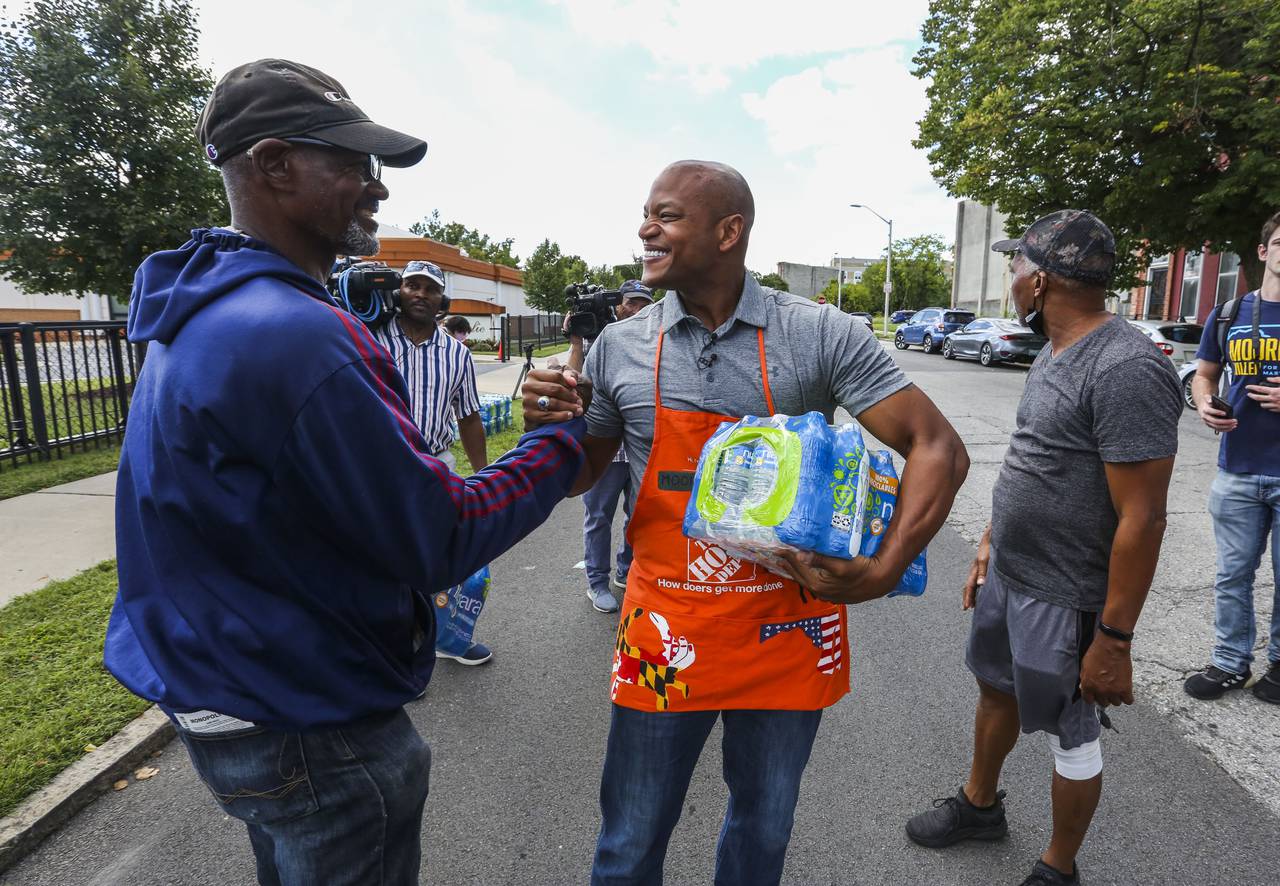 Maryland Candidate for Governor Wes Moore stops in West Baltimore to distribute water to the communities affected by the E.coli scare. He was assisted by Baltimore Home Depot store #5829.