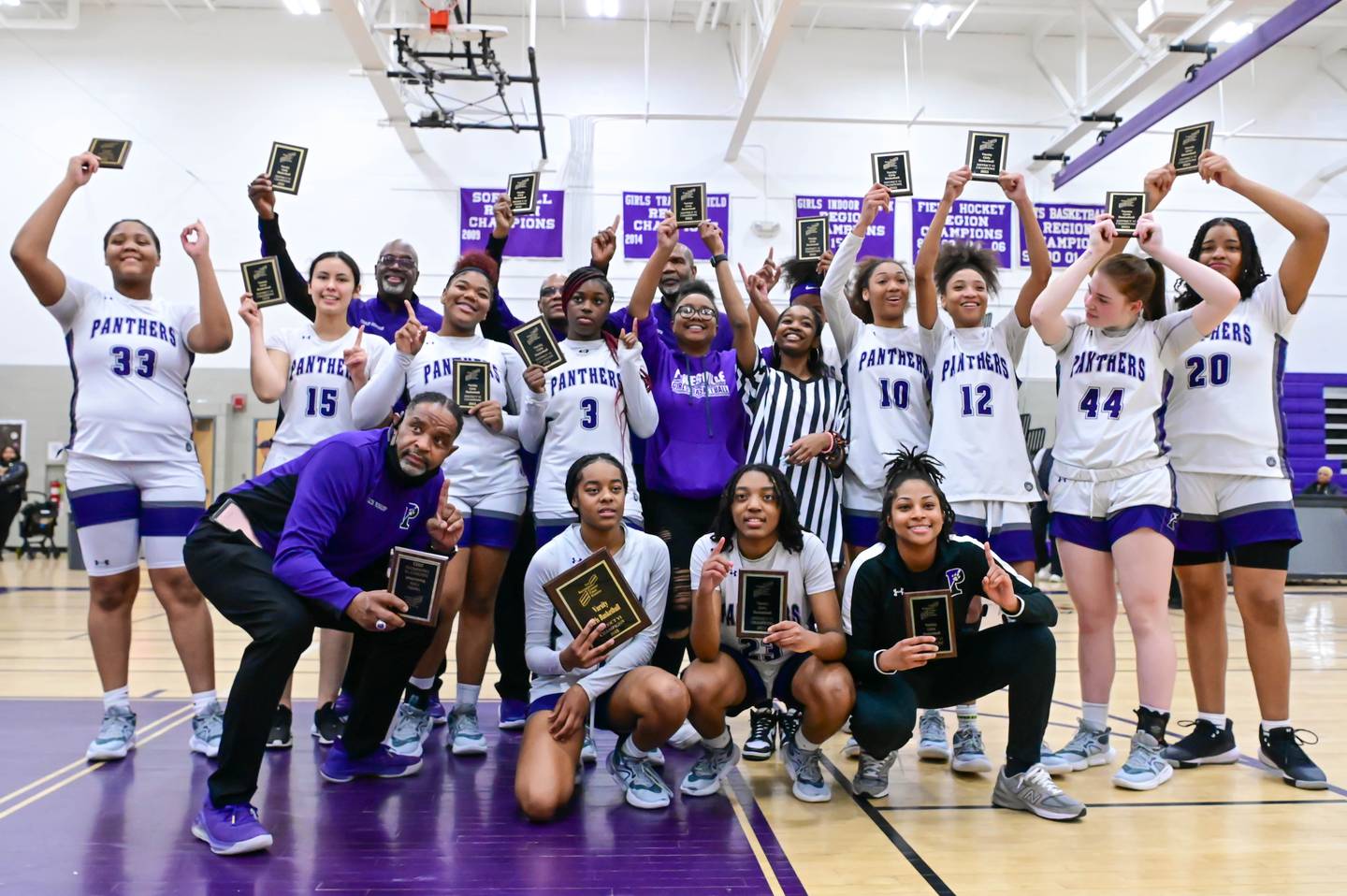 The Pikesville girls basketball teams celebrates its third Baltimore County girls basketball championship in the last five years.