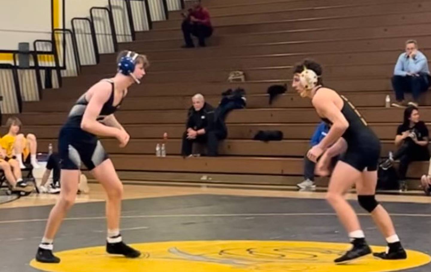 Gilman's Emmitt Sherlock faced off against South Carroll's Mike Pizzuto in the  138-pound match during last week's tri-meet at South Carroll. Sherlock defeated the two-time Class 2A-1A champion in 
the third overtime period.