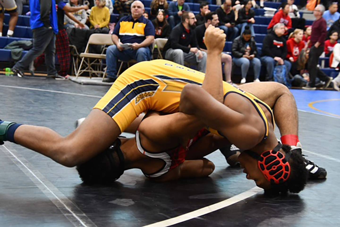 Perry Hall freshman Victor Marks-Jenkins (top) works for one of his 38 pins within his record of 46-0 at 145 pounds heading into this weekend's Class 4A-3A state tournament at Show Place Arena in Upper Marlboro.