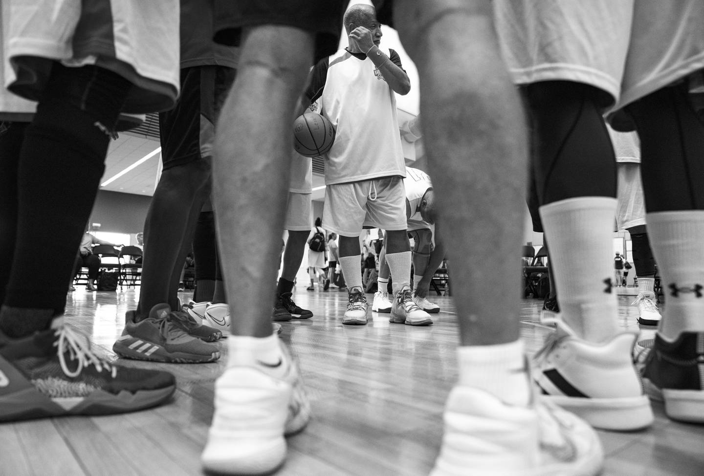 Baby Boomer’s George Pruden of Maryland meets with his team before competing in basketball at the National Senior Games at the David L. Lawrence Convention Center, in Pittsburgh, Friday, July 7, 2023.
