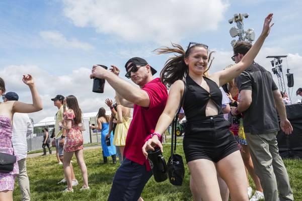 Preakness attendees enjoy Infield Fest with cocktails, dancing and friends on May 20, 2023.
