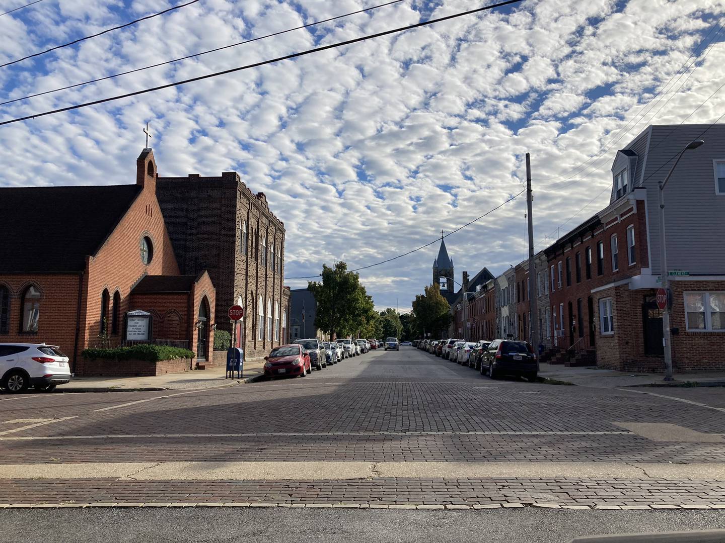 The view looking up Towson Street toward Our Lady of Counsel Catholic Church (right) in Locust Point.