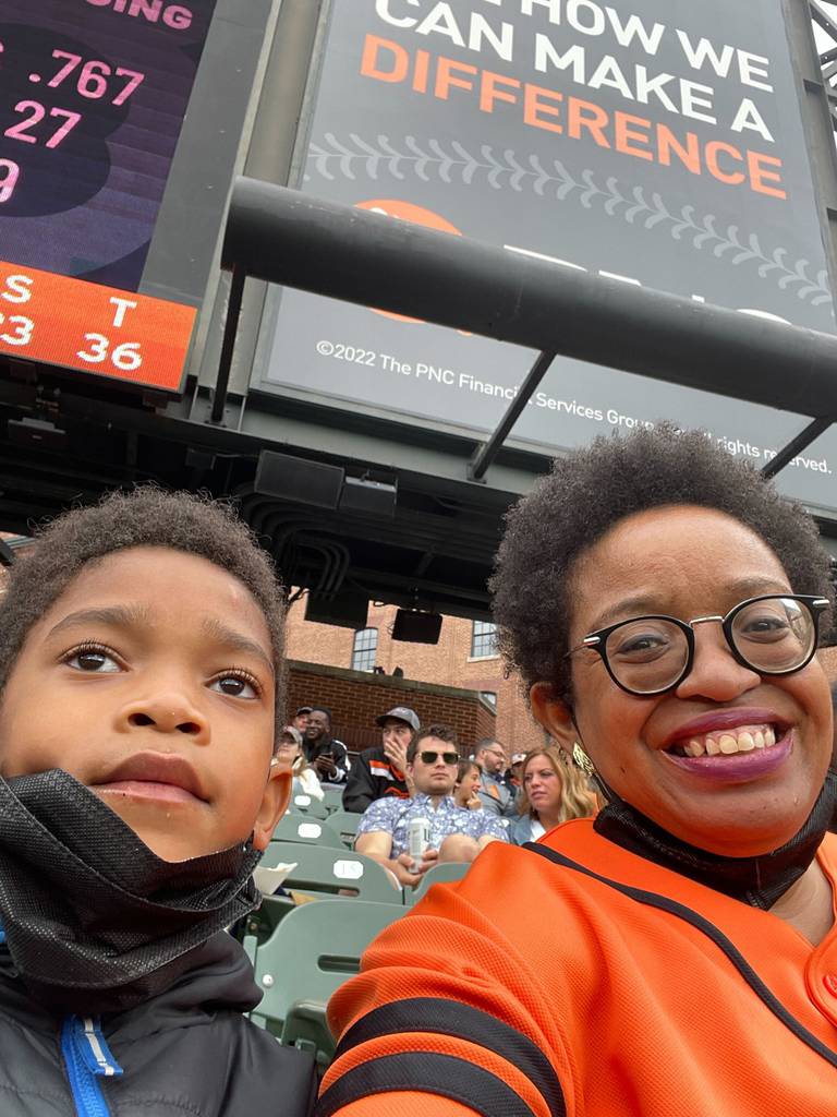 Baltimore Banner columnist Leslie Gray Streeter and son Brooks at an Orioles game this summer.