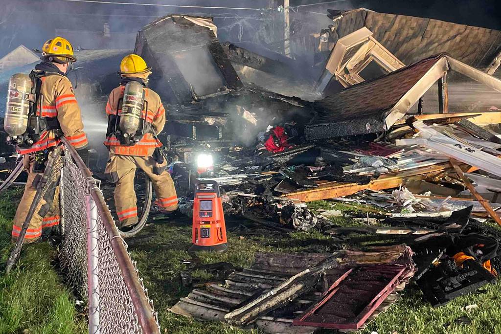 Baltimore County fire officials said they arrived in the Essex community late Saturday night and found a home engulfed by fire.