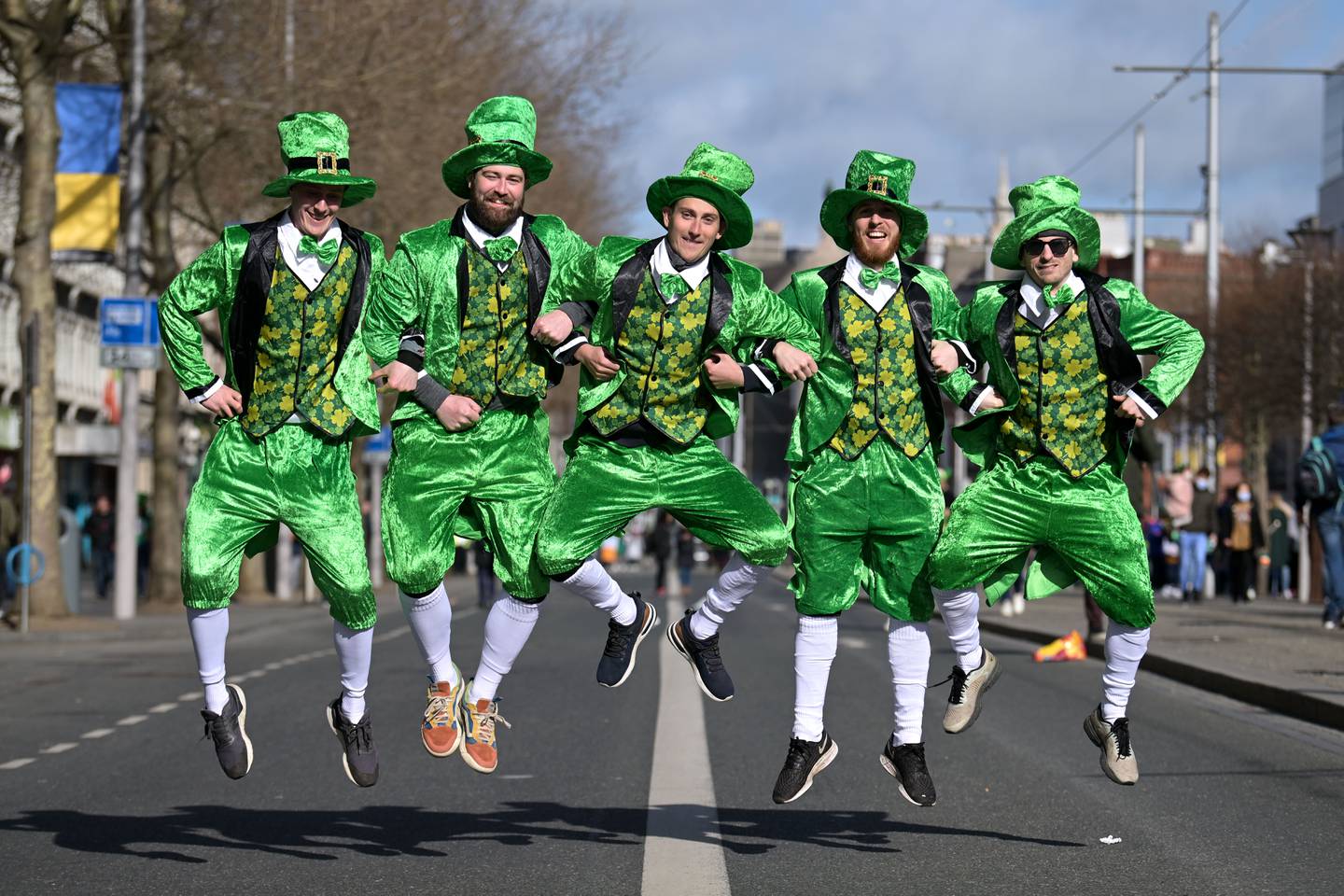 DUBLIN, IRELAND - MARCH 17: A group in fancy dress pose for a photo as Dubliners prepare to celebrate St Patrick's Day on March 17, 2022 in Dublin, Ireland. St Patrick's Day celebrations return to the streets of Dublin after a two-year absence, due to the Covid-19 pandemic.