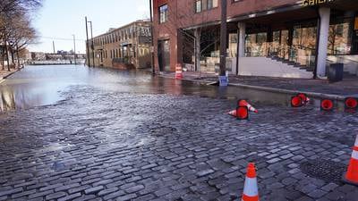 Flood and wind warnings continue Wednesday as Marylanders survey storm damage