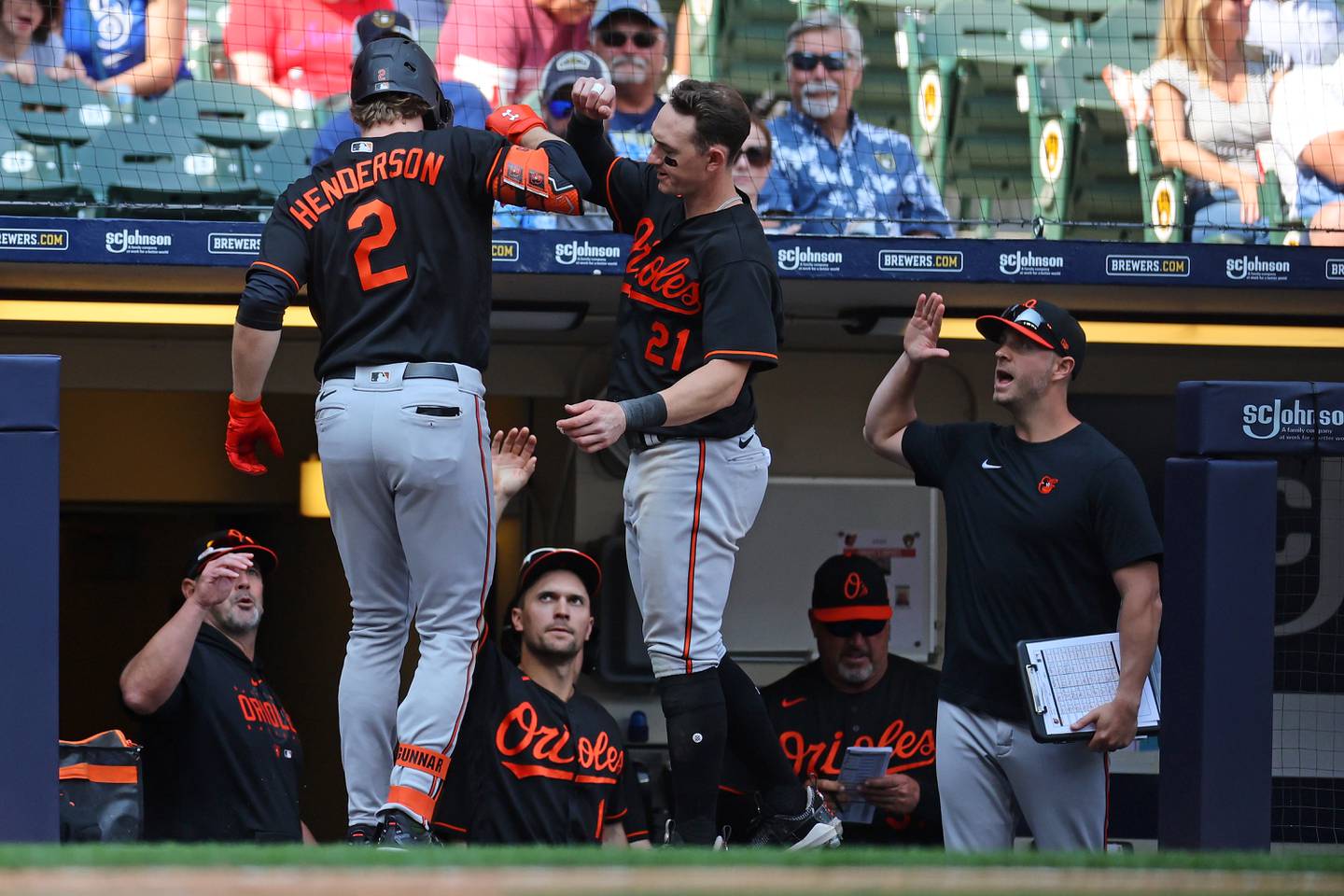 Gunnar Henderson #2 of the Baltimore Orioles is congratulated by teammates following a two run home run against the Milwaukee Brewers during the eighth inning at American Family Field on June 08, 2023 in Milwaukee, Wisconsin.