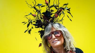 Photos: Hats, suits and ponchos round out the fashion at Preakness 