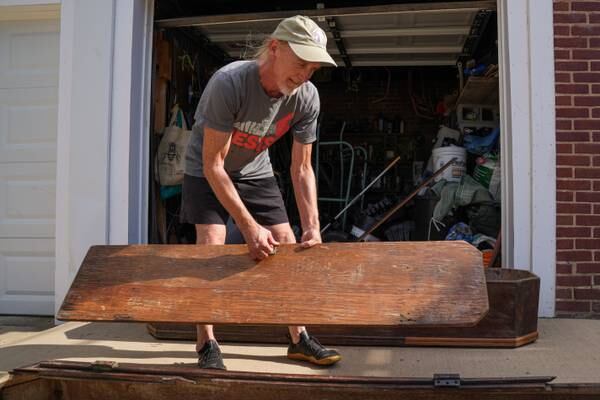 Artist aims to breathe new life into mysterious coffin found in North Baltimore park
