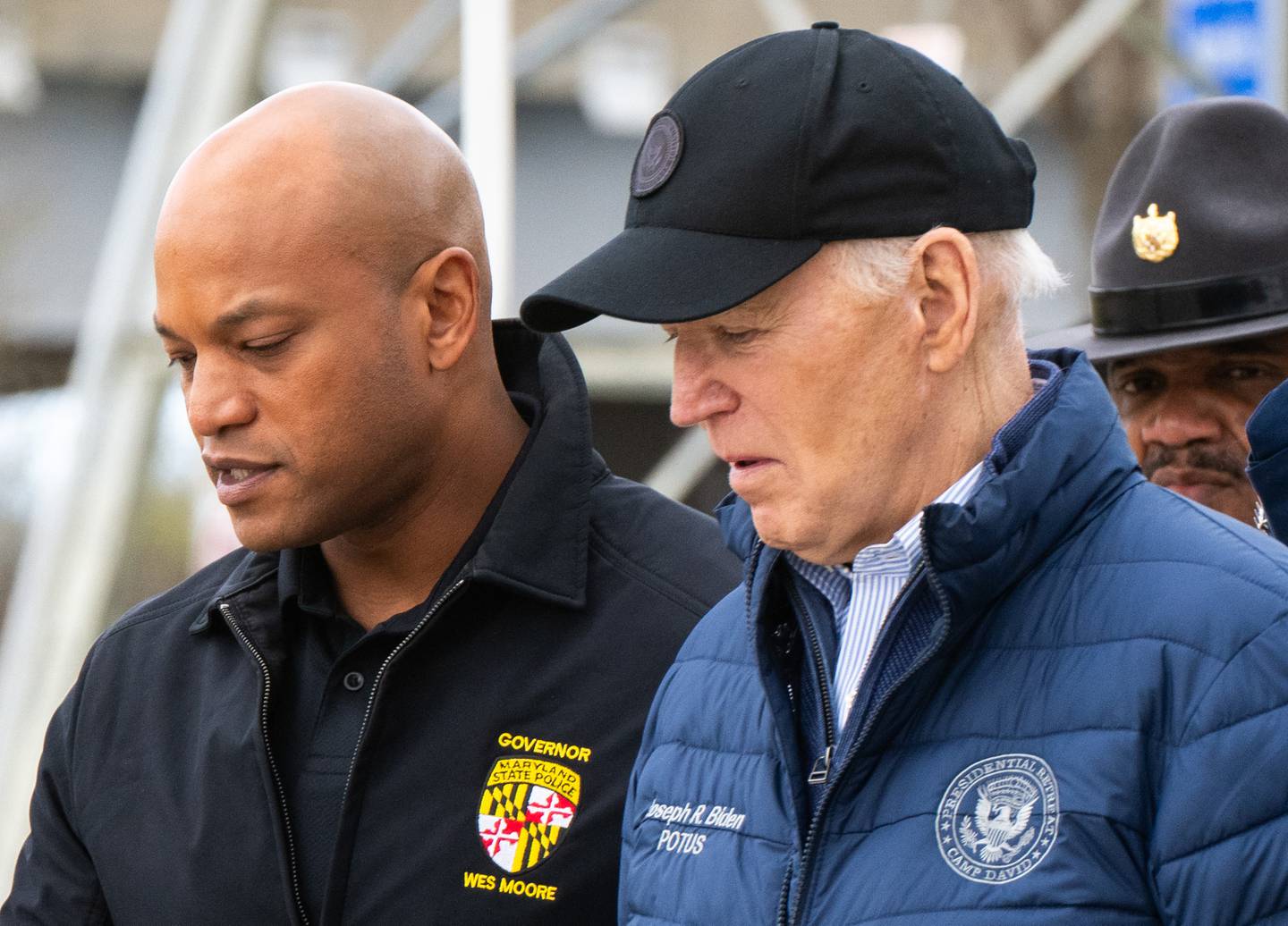 Gov. Wes Moore and President Joe Biden walk out for a press conference about the Key Bridge collapse at the Maryland Transportation Authority Police Headquarters in Dundalk on Friday, April 5, 2024.