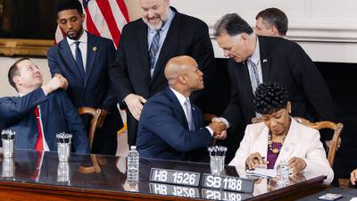 Moore signs first bills after legislative session, including Key Bridge-related measures