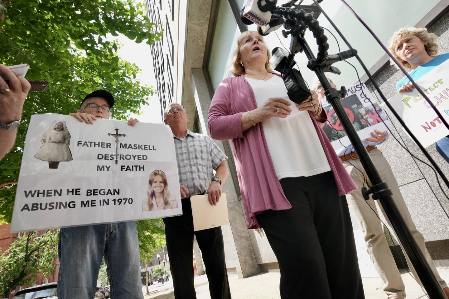 David Lorenz speaks at sidewalk news conference along with abuse survivors and advocates who are part of SNAP, the Survivors Network of those Abused by Priests, on May 8, 2023 outside of the Archdiocese of Baltimore.