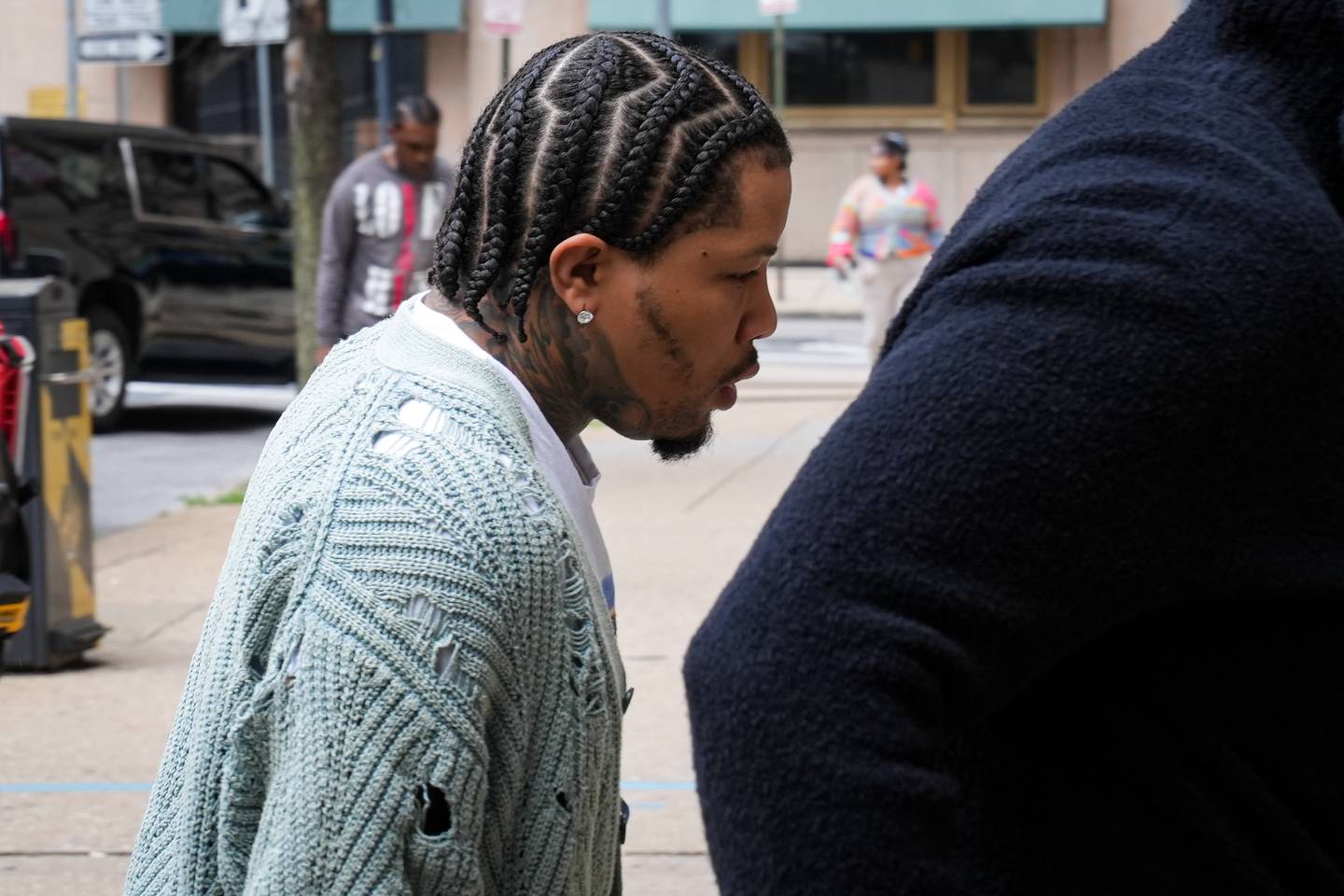 Baltimore boxing champion Gervonta “Tank” Davis arrives for his sentencing at the Elijah E. Cummings Courthouse on Friday, May 5. Davis pleaded guilty to four traffic offenses in connection to a hit-and-run in 2020 that injured four people.