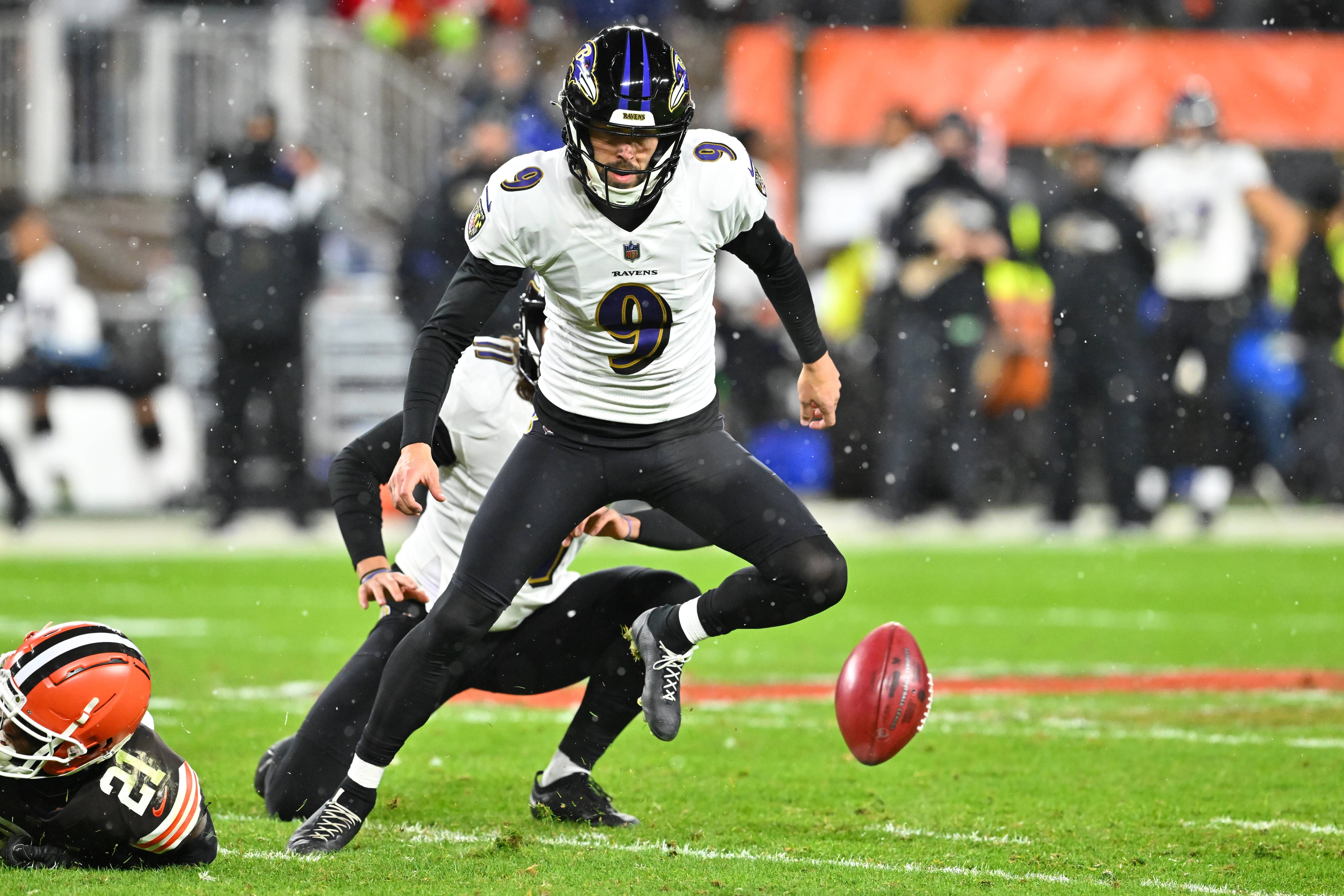 CLEVELAND, OHIO - DECEMBER 17: Justin Tucker #9 of the Baltimore Ravens watches the loose football after his field goal attempt was blocked by the against the Cleveland Browns during the fourth quarter at FirstEnergy Stadium on December 17, 2022 in Cleveland, Ohio.