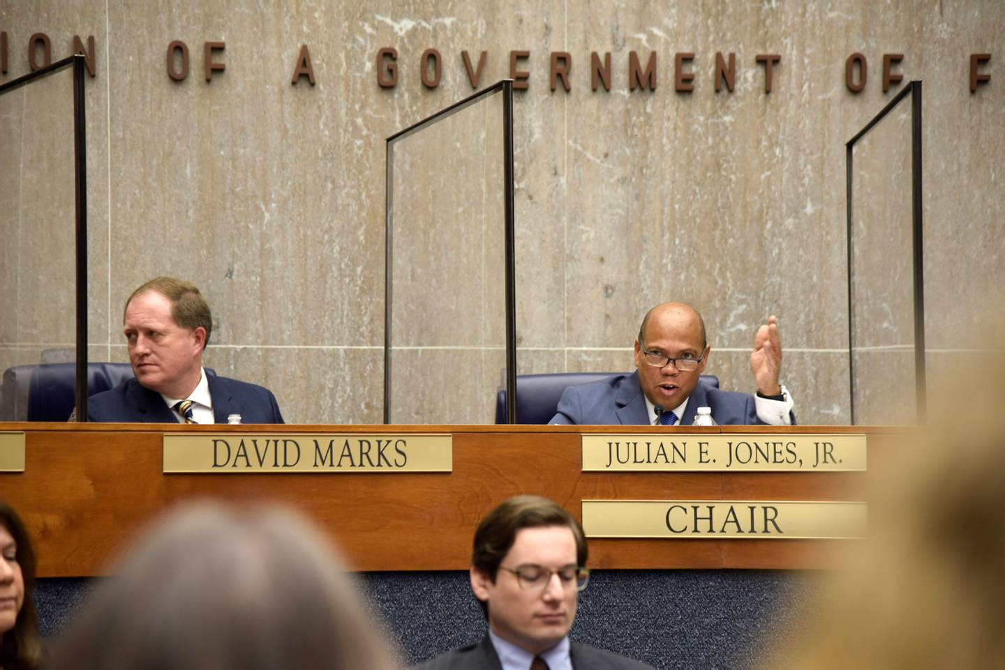 Baltimore County Councilman David Marks, a Republican, and Democratic council chair Julian Jones sit in the County Council chambers before a budget announcement in April 2022.