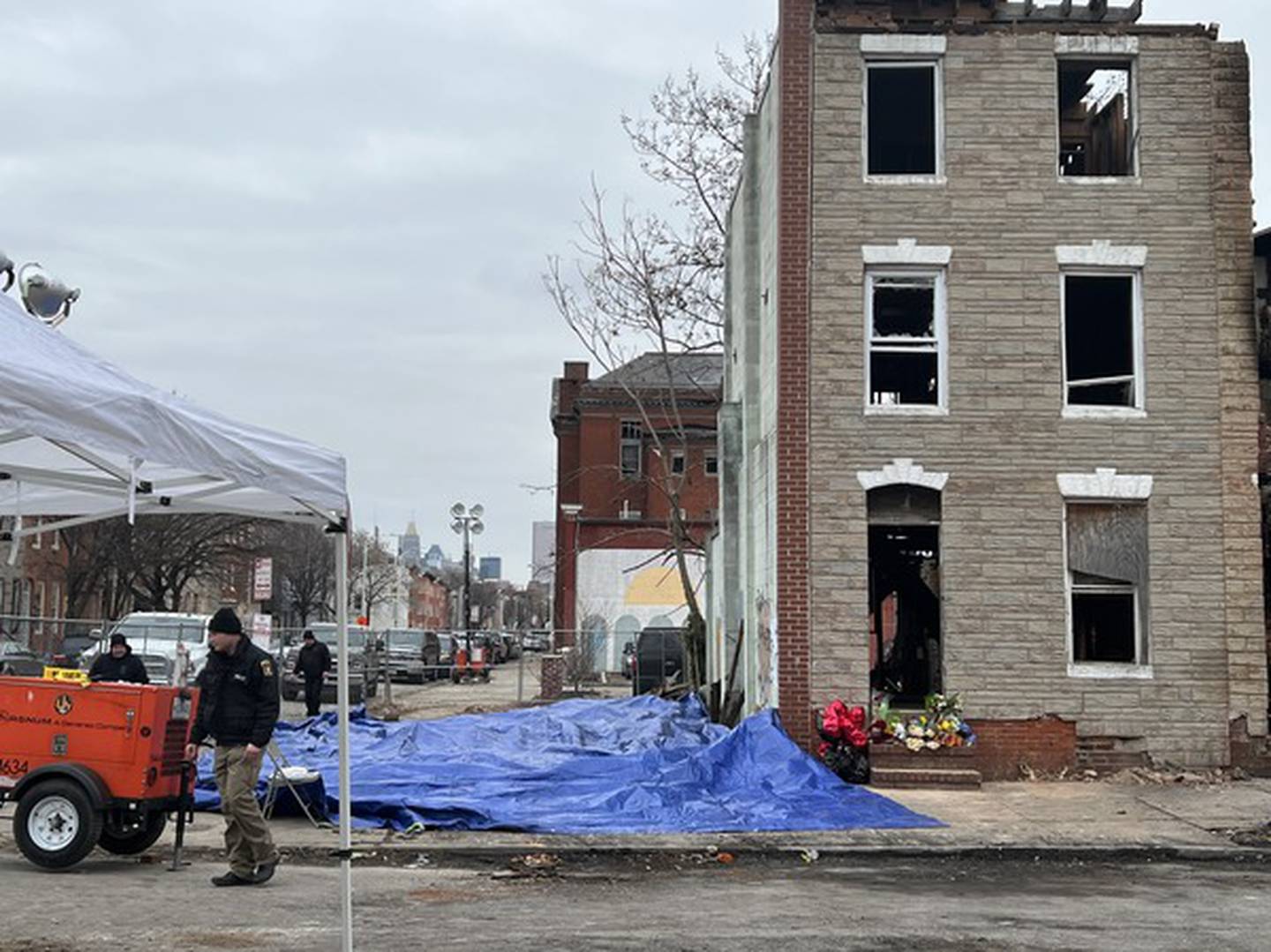 The site of a vacant home that burned and collapsed in the 200 block of S. Stricker St., killing three Baltimore firefighters.