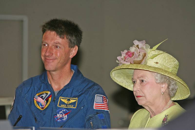 HRH Queen Elizabeth II  stands next to Michael Foale as she sees live images from the International Space Station on a monitor in mission control as she visits NASA’s Goddard Space Flight Center on May 7, 2007 in Greenbelt, Maryland. This is the final day of a six day state tour of the United States to commemorate the 400 year anniversary of the settlement of Jamestown. This will be the fourth time that Her Majesty and His Royal Highness have visited the US.