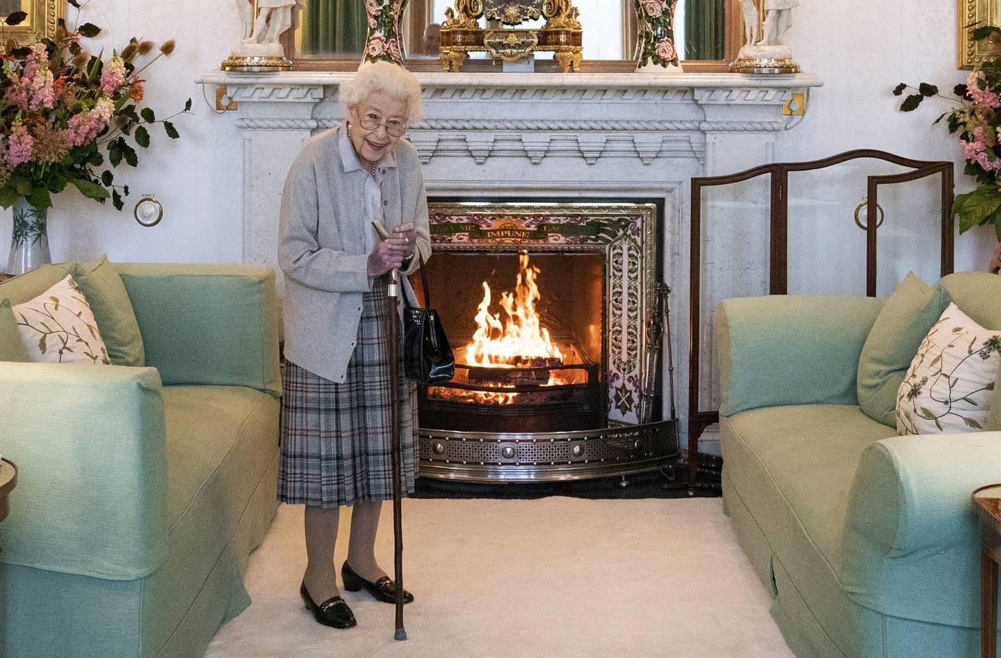 Britain's Queen Elizabeth II waits in the Drawing Room before receiving Liz Truss for an audience at Balmoral, in Scotland, Tuesday, Sept. 6, 2022, where Truss was invited to become Prime Minister and form a new government. Buckingham Palace says Queen Elizabeth II is under medical supervision as doctors are “concerned for Her Majesty’s health.” The announcement comes a day after the 96-year-old monarch canceled a meeting of her Privy Council and was told to rest.