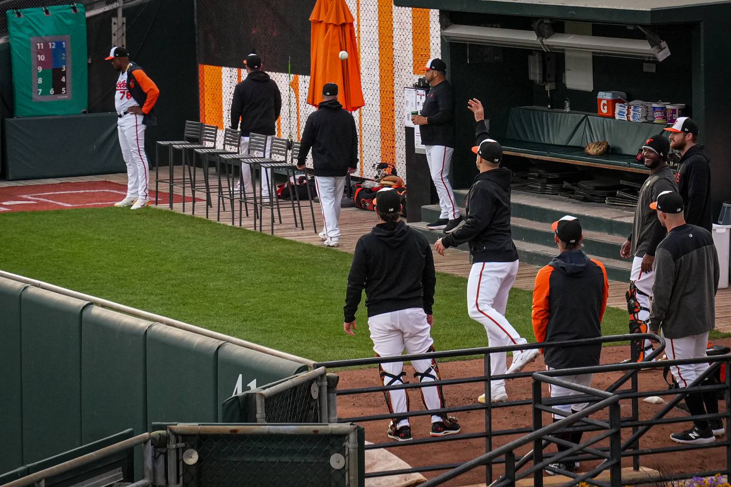 Baltimore Orioles relief pitchers play a quick round of Bocce before the first pitch in their game against the Boston Red Sox at Camden Yards on Tuesday, April 25.