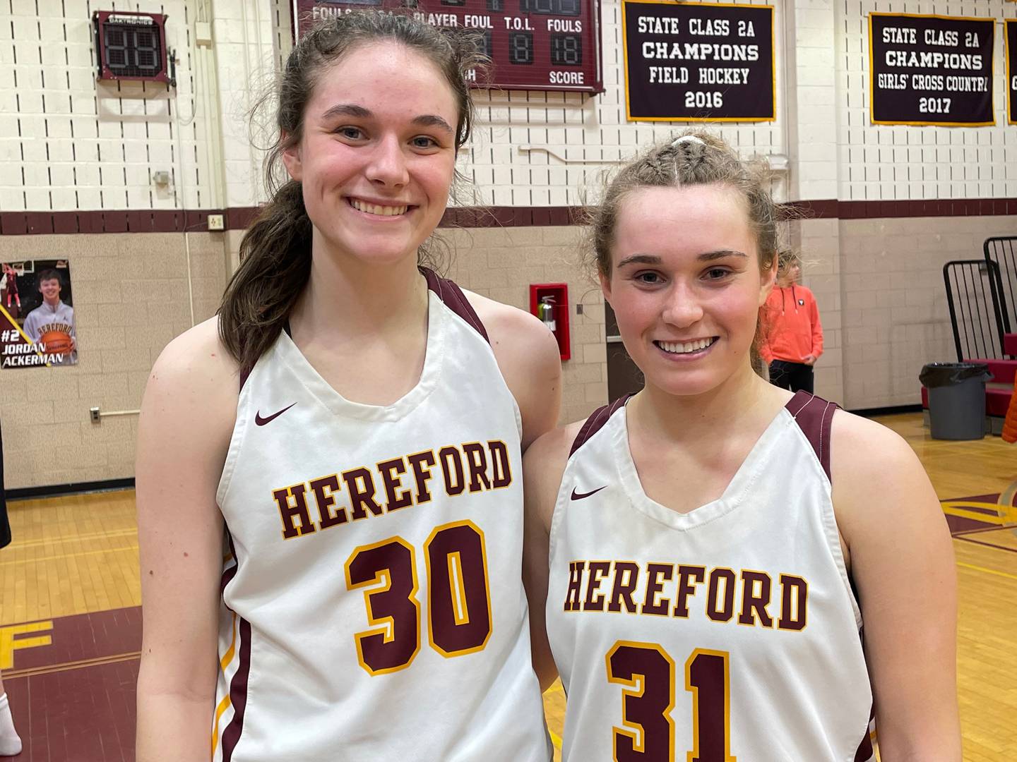 Junior forward Lauren Kraft (30) and senior guard Lauren Orner (31) combined for 20 points and 15 rebounds to lead Hereford to a 37-24 victory over Harford Tech in Friday night's Class 2A state quarterfinal.
