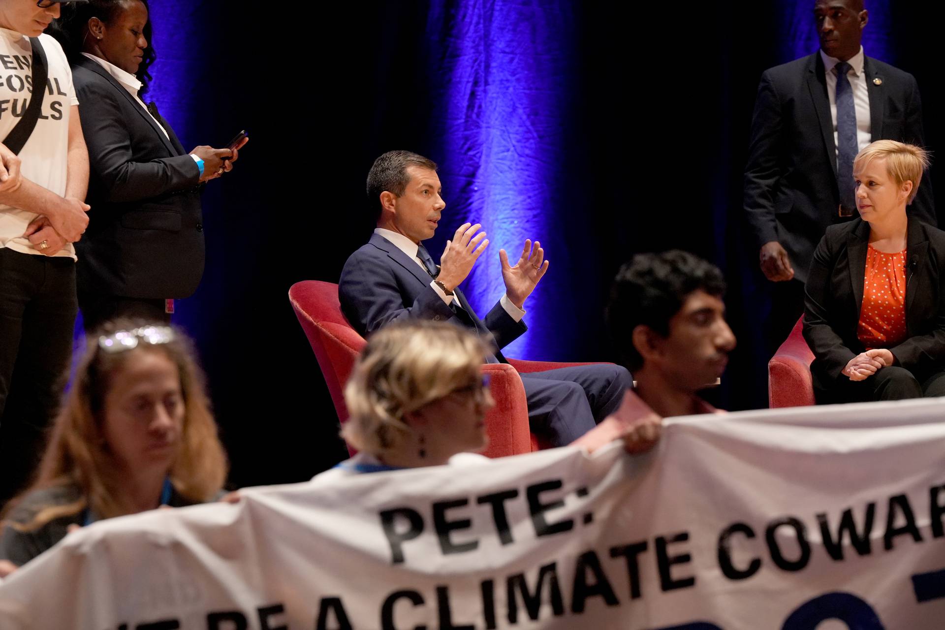 The group Climate Defiance disrupted a conversation with U.S. Secretary of Transportation Pete Buttigieg at the iMPACT Maryland conference hosted by The Baltimore Banner on Tuesday, Oct. 10, 2023.