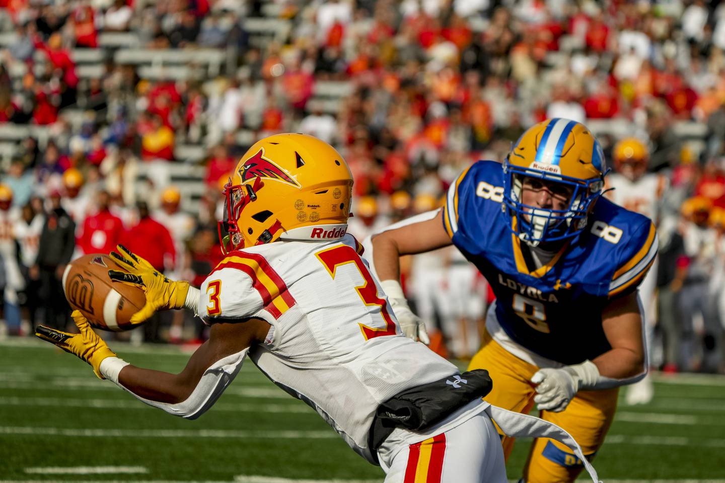 Calvert HallÕs Oliver Redd makes a touchdown catch during the 102nd edition of the Thanksgiving Day matchup between the Calvert Hall Cardinals and the Loyola Dons at Johnny Unitas Stadium in Towson, Maryland on November 24, 2022. photo by Scott Serio for The Baltimore Banner