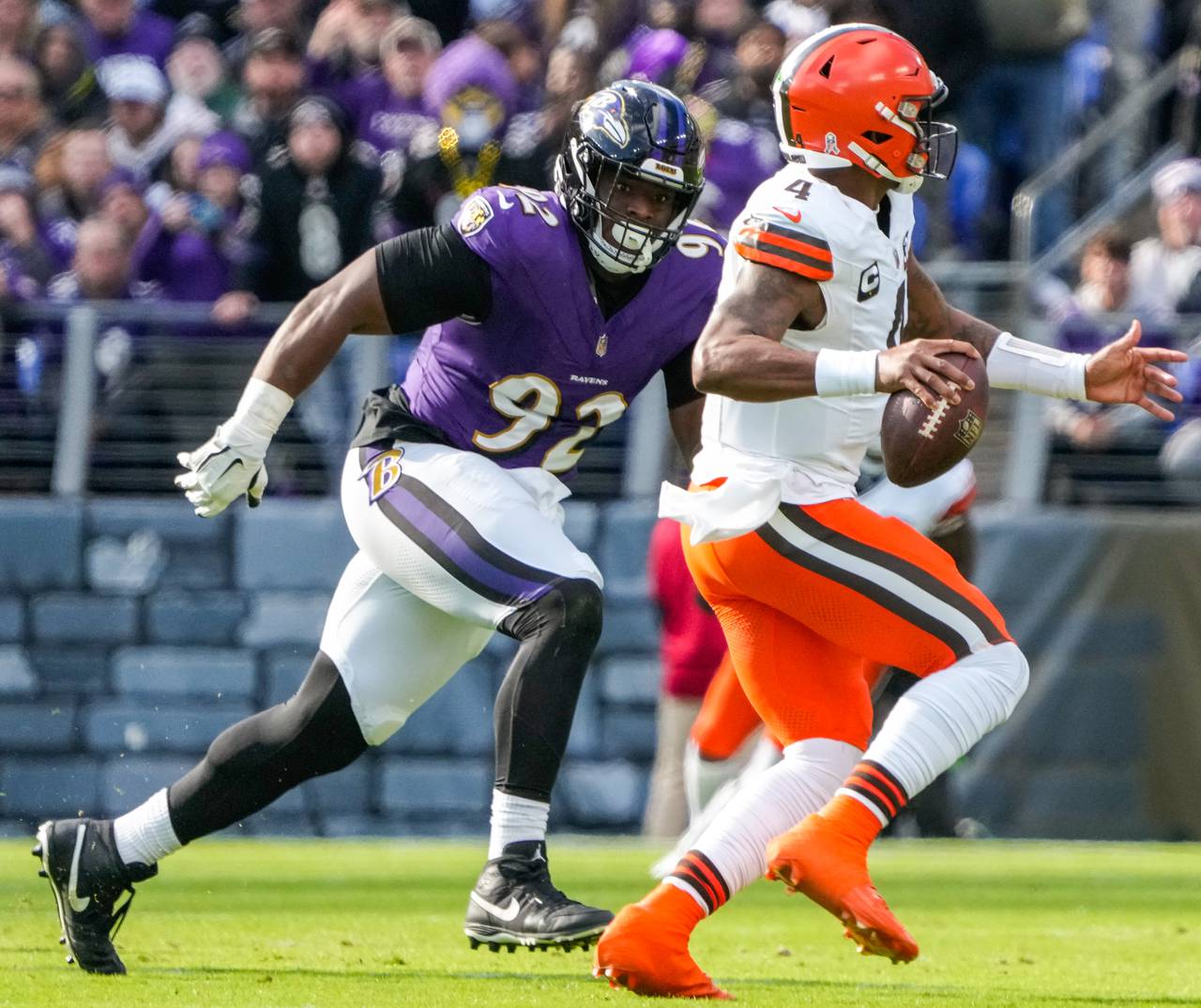 Baltimore Ravens defensive tackle Justin Madubuike (92) pressures Cleveland Browns quarterback Deshaun Watson (4) during the first quarter at M&T Bank Stadium on Sunday, Nov. 12, 2023.
