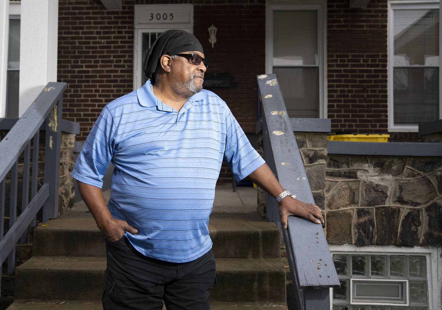 Brian Oliver poses for a portrait outside of his home in Baltimore, MD, Thursday, October 13, 2022.