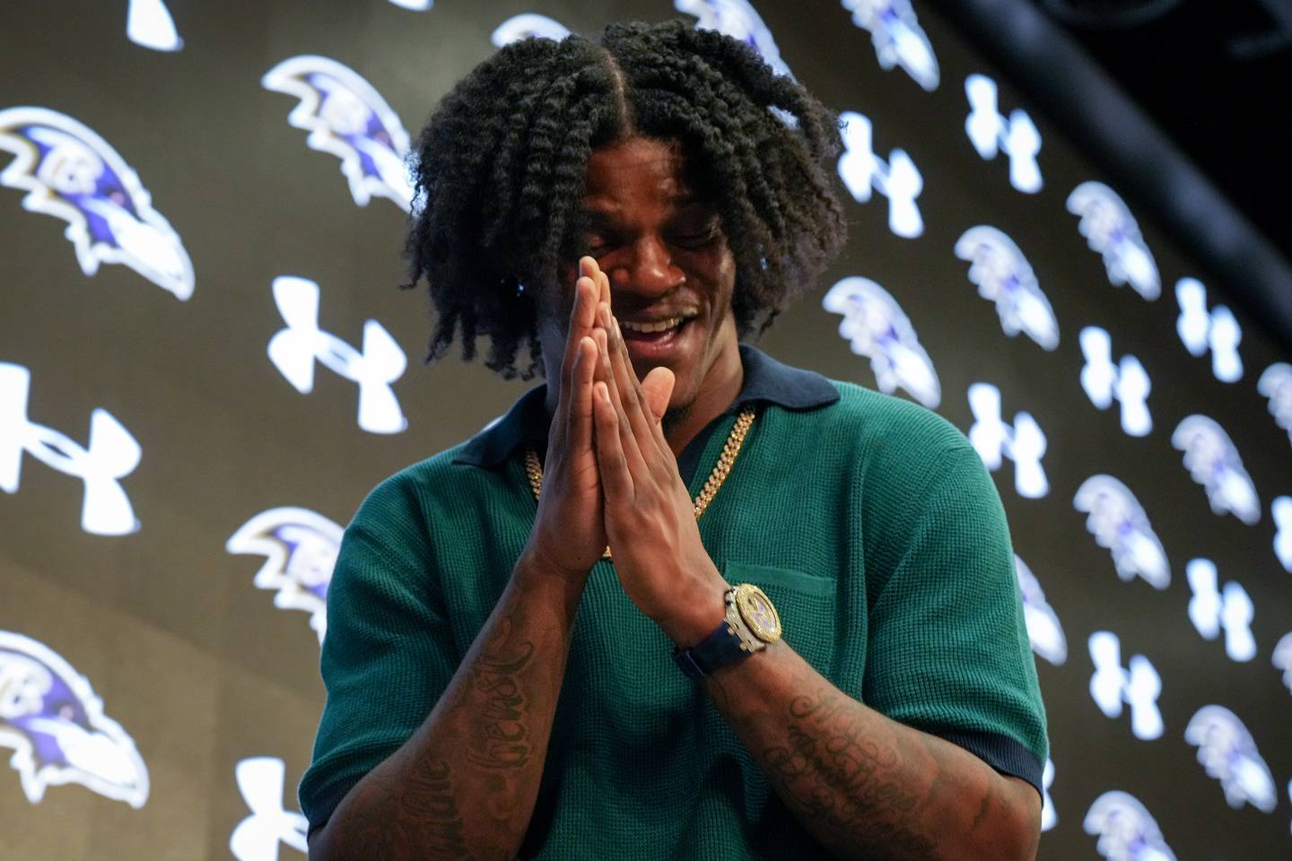 Baltimore Ravens quarterback Lamar Jackson laughs during an interview following a press conference at the Under Armour Performance Center on Thursday, May 4. Jackson and the Ravens recently came to an agreement on his contract extension, a 5-year deal worth $260 million.