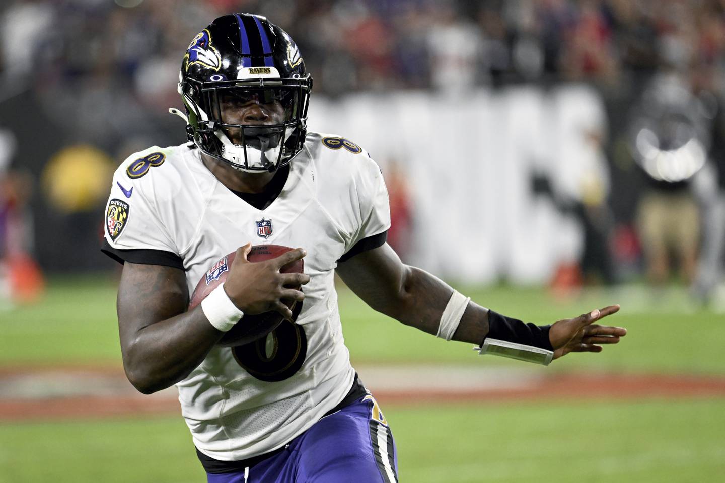 Baltimore Ravens quarterback Lamar Jackson scrambles during the second half of an NFL football game against the Tampa Bay Buccaneers Thursday, Oct. 27, 2022, in Tampa, Fla.